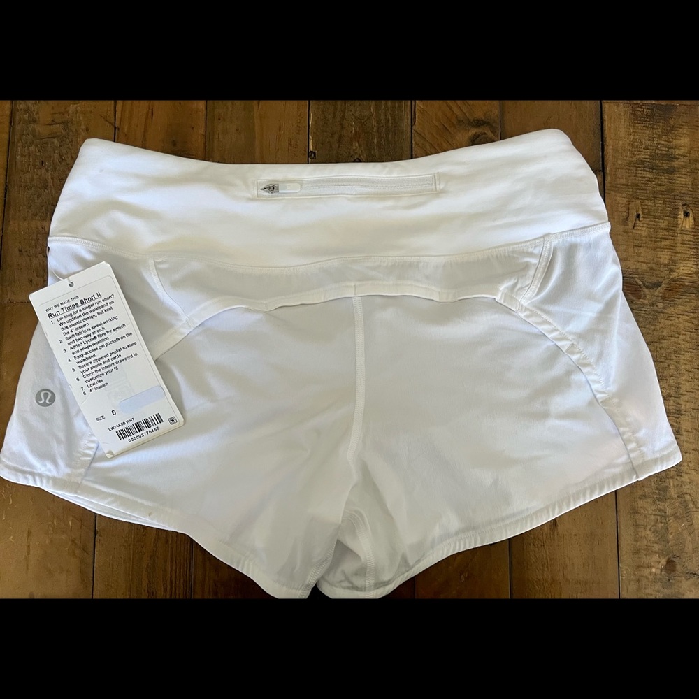 Brand new with tags white lulu lemon Runtime shorts. 4” inseam
